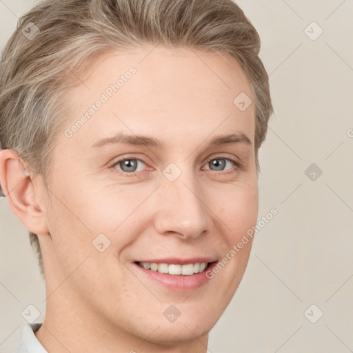 Joyful white young-adult female with short  brown hair and grey eyes