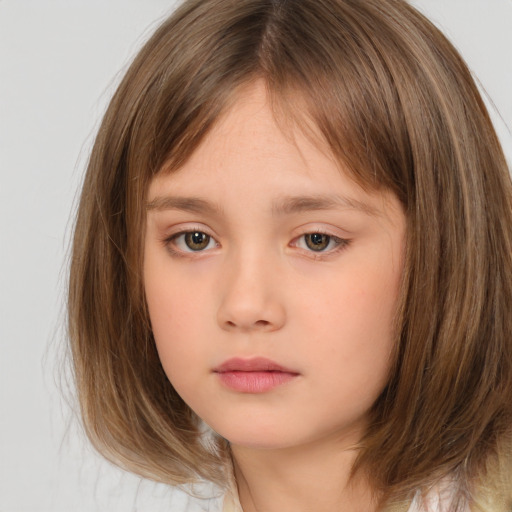 Neutral white child female with medium  brown hair and brown eyes