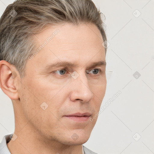 Neutral white adult male with short  brown hair and brown eyes