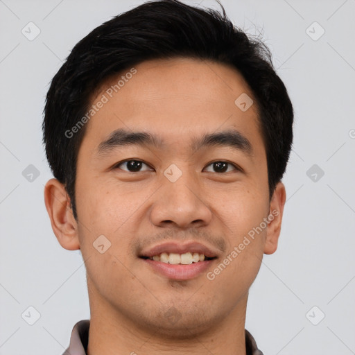 Joyful asian young-adult male with short  black hair and brown eyes