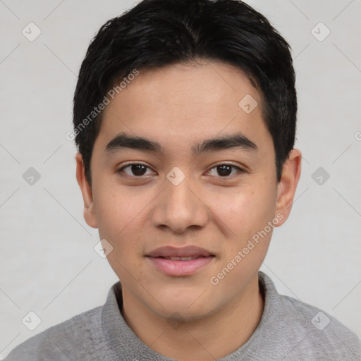 Joyful asian young-adult male with short  black hair and brown eyes