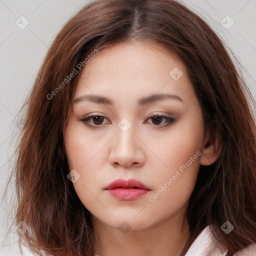 Neutral white young-adult female with long  brown hair and brown eyes