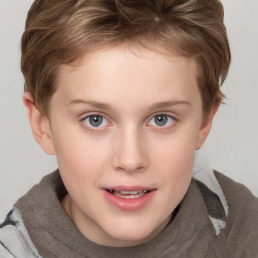 Joyful white child female with short  brown hair and grey eyes