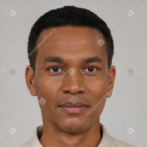 Neutral latino young-adult male with short  black hair and brown eyes