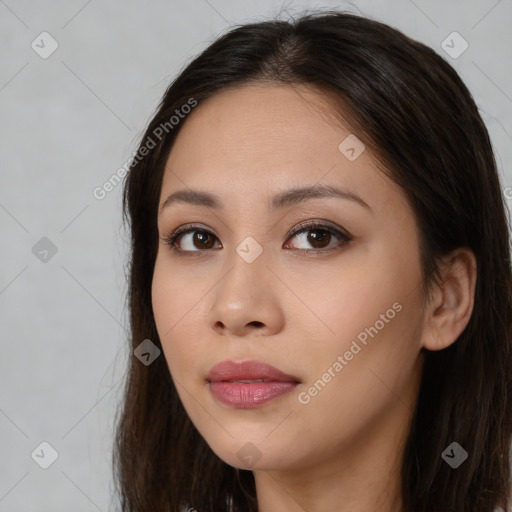 Neutral white young-adult female with long  brown hair and brown eyes