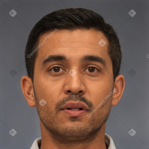 Neutral white young-adult male with short  brown hair and brown eyes
