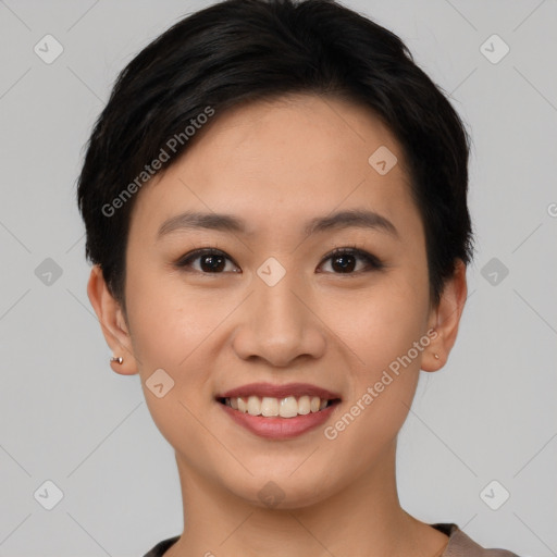 Joyful asian young-adult female with short  black hair and brown eyes