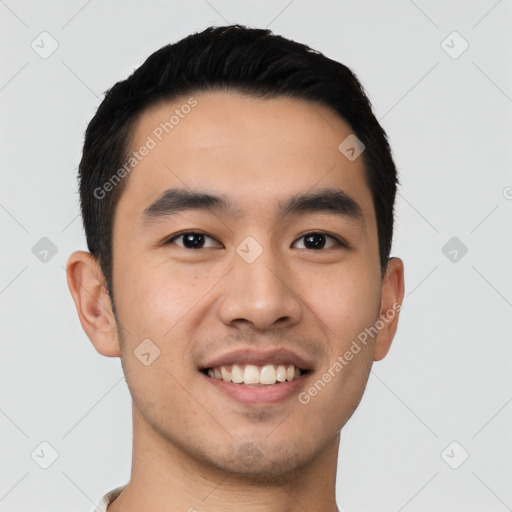 Joyful latino young-adult male with short  black hair and brown eyes