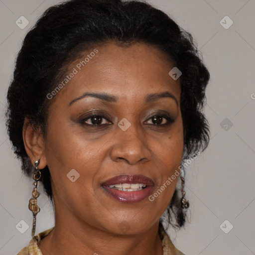 Joyful black adult female with medium  brown hair and brown eyes