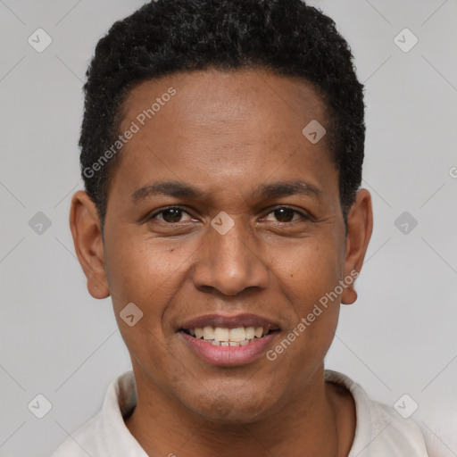 Joyful latino young-adult male with short  black hair and brown eyes