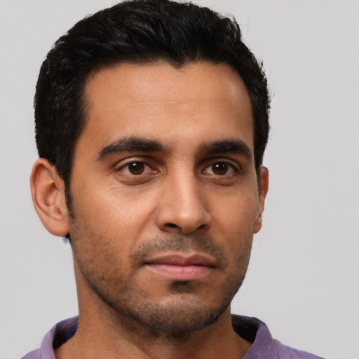 Neutral latino young-adult male with short  black hair and brown eyes