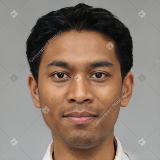 Joyful latino young-adult male with short  black hair and brown eyes