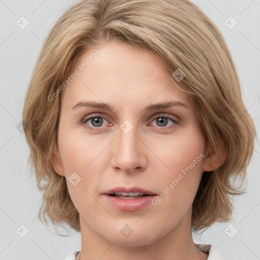 Joyful white young-adult female with medium  brown hair and blue eyes