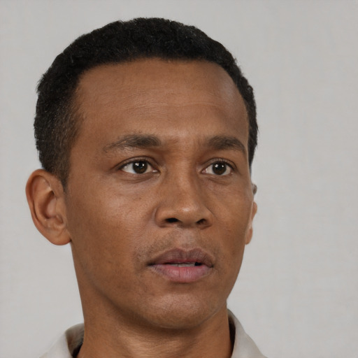 Neutral black young-adult male with short  brown hair and brown eyes