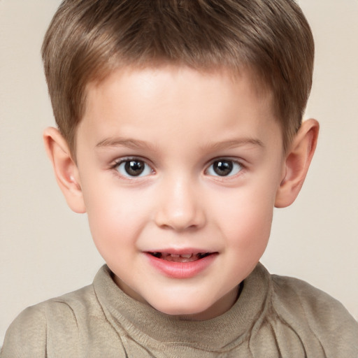 Joyful white child male with short  brown hair and brown eyes