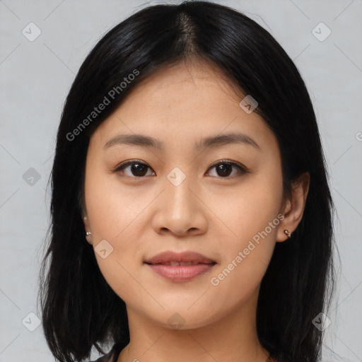 Joyful asian young-adult female with medium  black hair and brown eyes