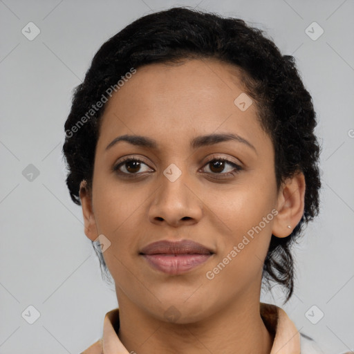 Joyful latino young-adult female with short  black hair and brown eyes