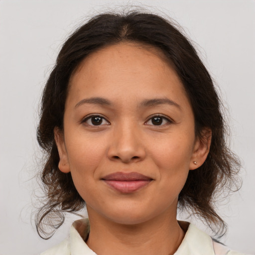 Joyful asian young-adult female with medium  brown hair and brown eyes