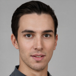 Neutral white young-adult male with short  brown hair and brown eyes