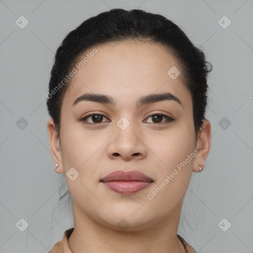 Joyful latino young-adult female with long  brown hair and brown eyes