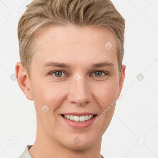 Joyful white young-adult male with short  brown hair and grey eyes