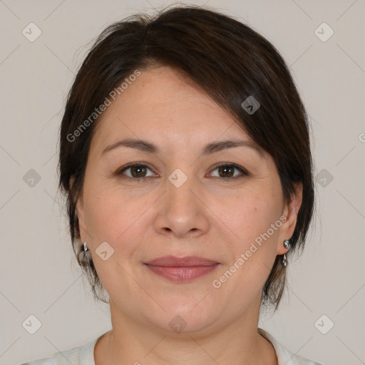 Joyful white adult female with medium  brown hair and brown eyes