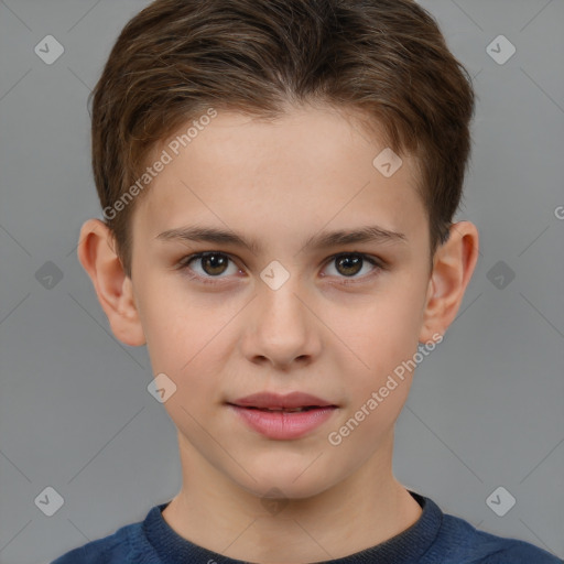 Joyful white child male with short  brown hair and brown eyes