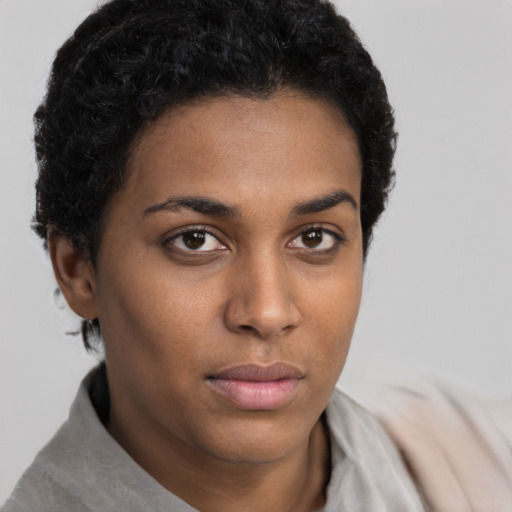Neutral black young-adult female with short  brown hair and brown eyes