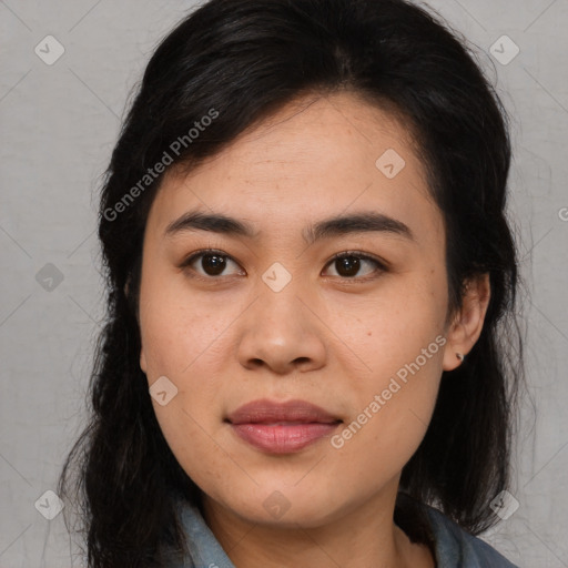 Joyful asian young-adult female with medium  black hair and brown eyes