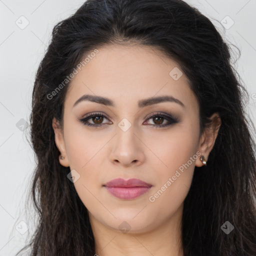 Joyful latino young-adult female with long  brown hair and brown eyes
