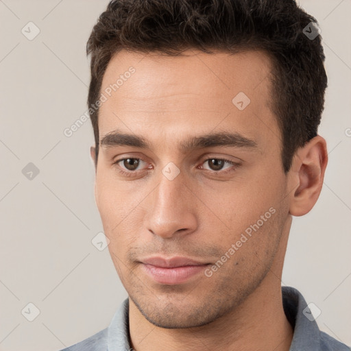 Neutral white young-adult male with short  brown hair and brown eyes