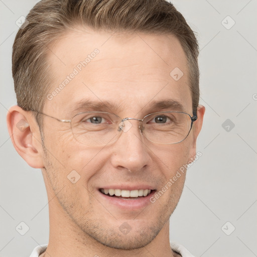 Joyful white adult male with short  brown hair and grey eyes