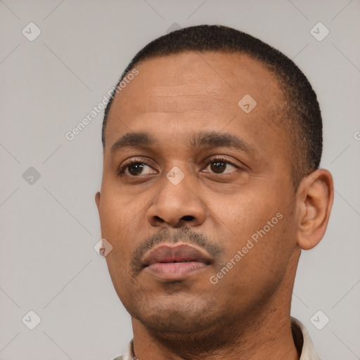 Neutral black young-adult male with short  black hair and brown eyes