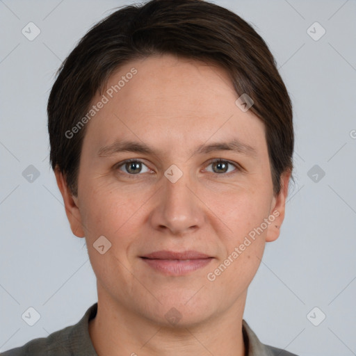 Joyful white adult male with short  brown hair and grey eyes