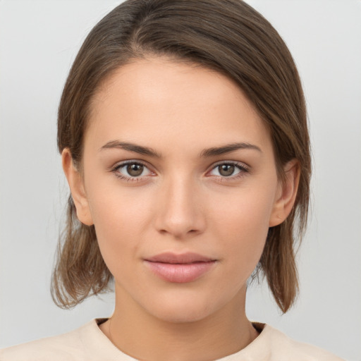 Neutral white young-adult female with medium  brown hair and brown eyes