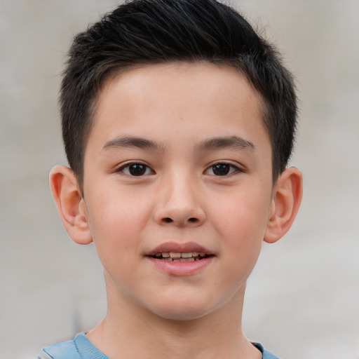 Joyful white child male with short  brown hair and brown eyes