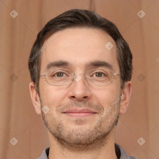 Joyful white adult male with short  brown hair and brown eyes