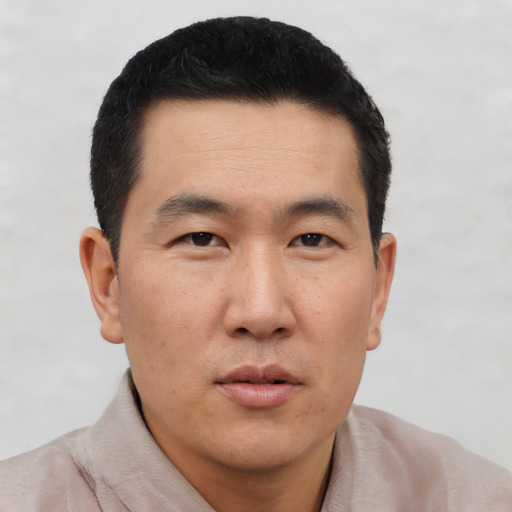 Neutral asian young-adult male with short  black hair and brown eyes