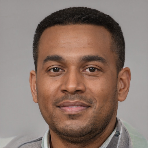 Neutral latino young-adult male with short  brown hair and brown eyes
