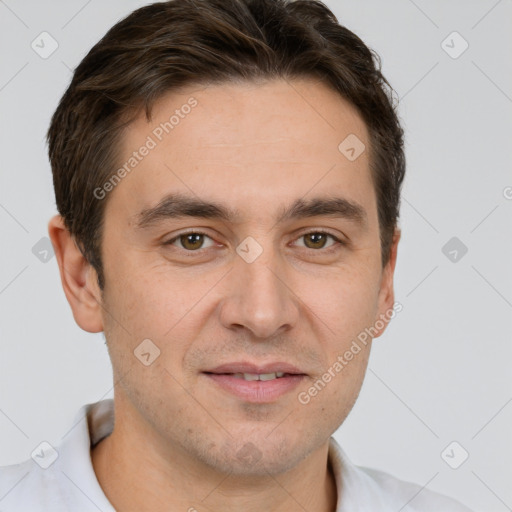 Joyful white young-adult male with short  brown hair and brown eyes