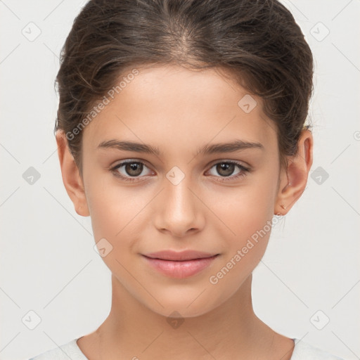 Joyful white child female with short  brown hair and brown eyes