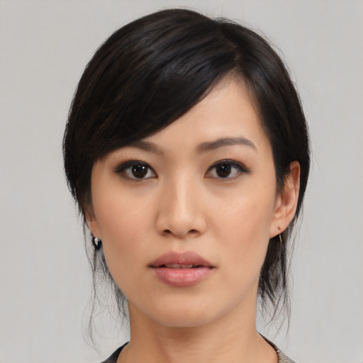 Neutral asian young-adult female with medium  black hair and brown eyes