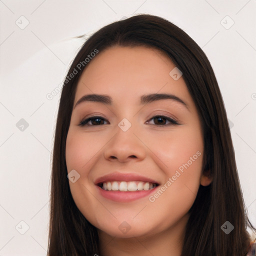 Joyful white young-adult female with long  black hair and brown eyes