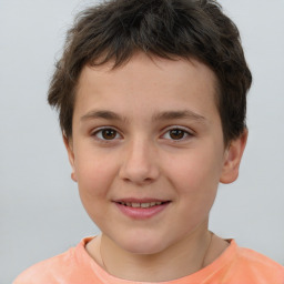 Joyful white child male with short  brown hair and brown eyes