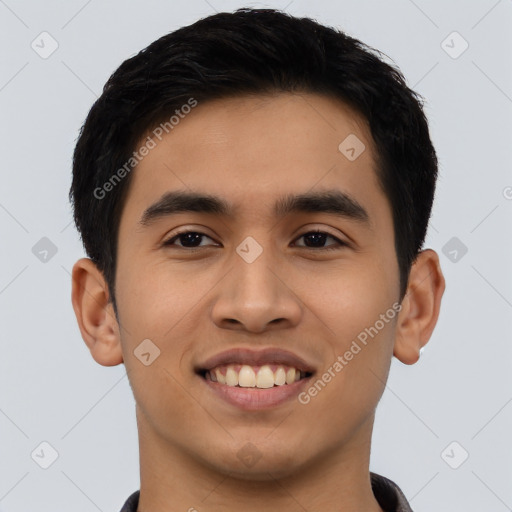 Joyful asian young-adult male with short  black hair and brown eyes