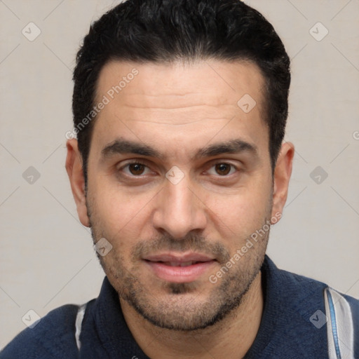 Joyful white young-adult male with short  black hair and brown eyes