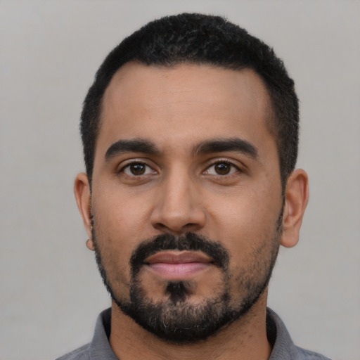 Neutral latino young-adult male with short  black hair and brown eyes