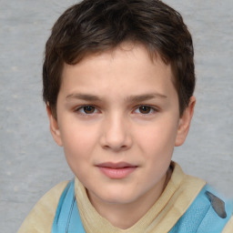 Joyful white child male with short  brown hair and brown eyes