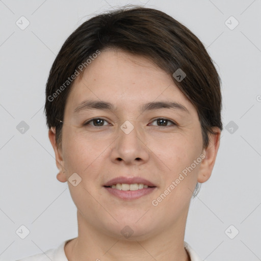 Joyful white young-adult female with short  brown hair and brown eyes