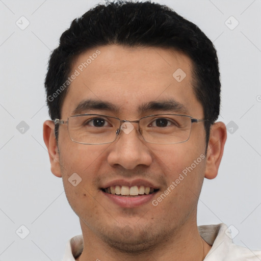 Joyful asian young-adult male with short  black hair and brown eyes